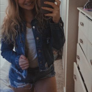 Denim jacket with distressed rips!